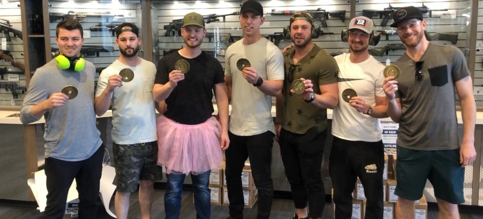 Bachelor party group celebrating together at a Scottsdale indoor shooting range